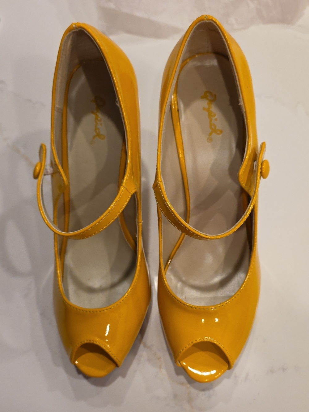 Qupid Yellow Patent Mary Jane Peep-Toe Heels.